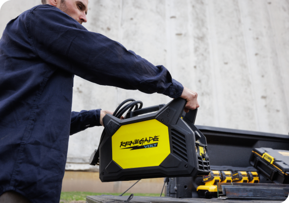 Man loading Renegade Volt on truck.